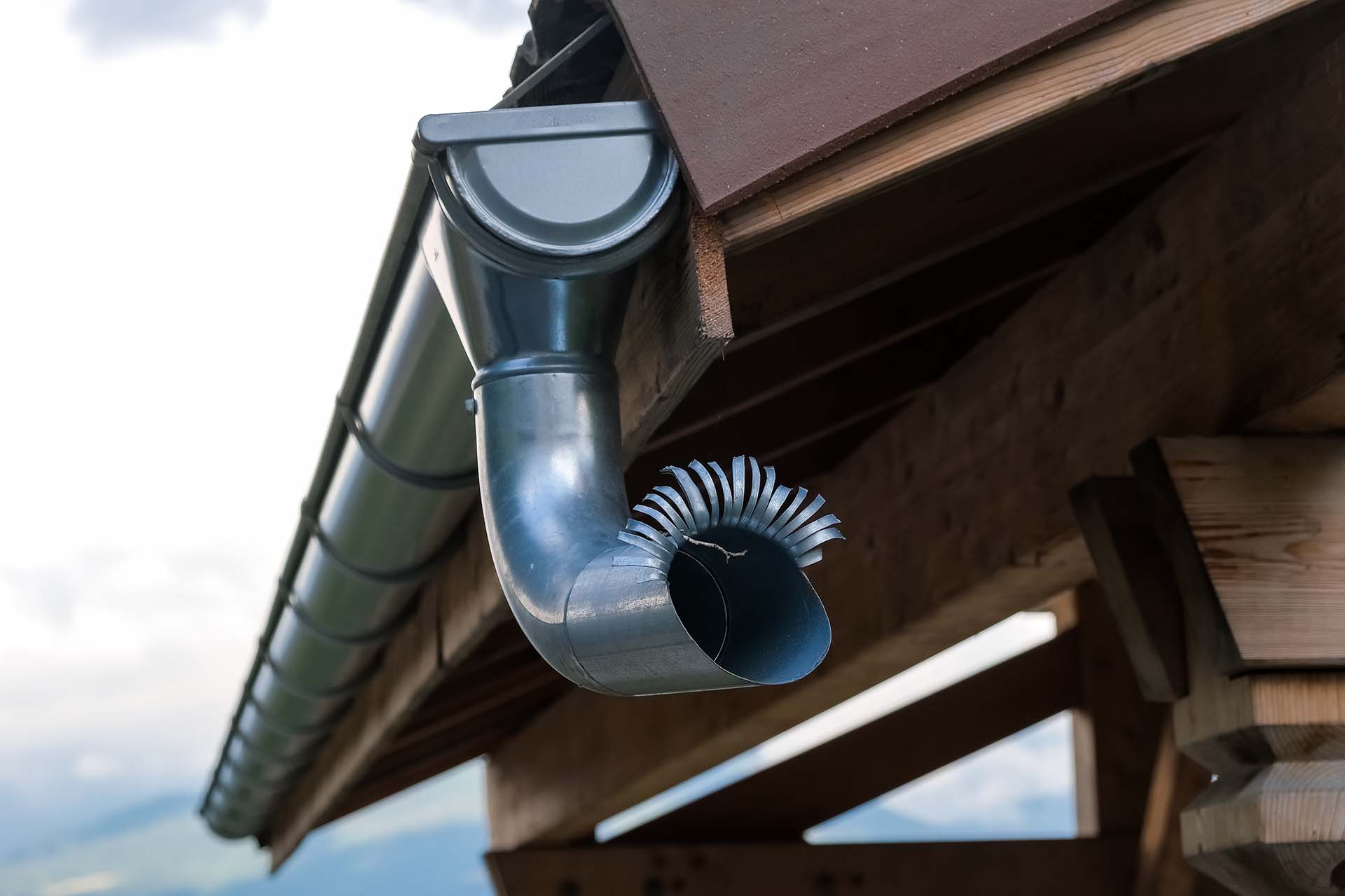 External pipes to drain the water from heavy rains on the roofs of mountain houses.